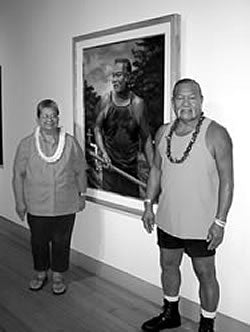 Marco Eskaran and his wife, Ah Moi, with portrait "Marco Eskaran, Pillar of Strength". Shaefer Portrait Challenge 2006, Maui Arts & Cultural Center.