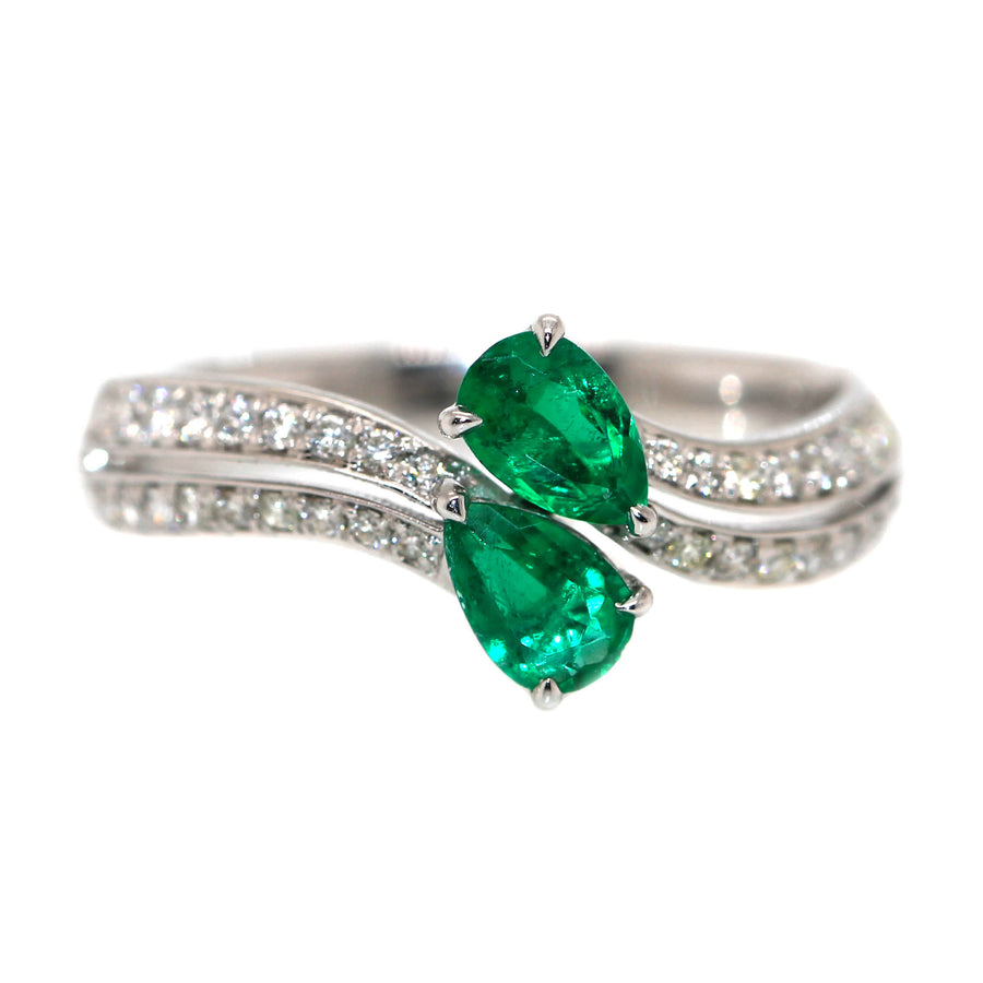 emerald and diamond crossover ring