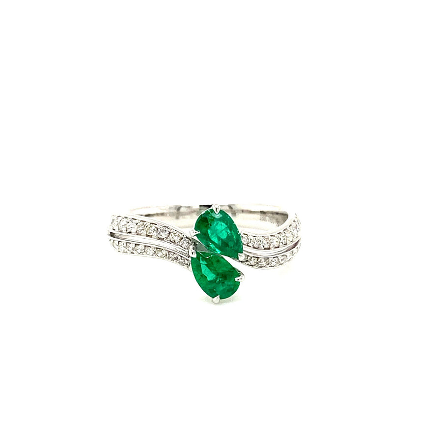 emerald and diamond crossover ring