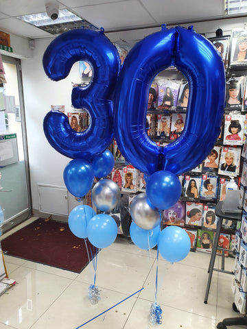 two five balloon bouquets with 34" blue number 3 and 0 foil balloons