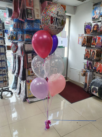 bunch of six printed helium balloons with a Happy Birthday foil balloon & weight