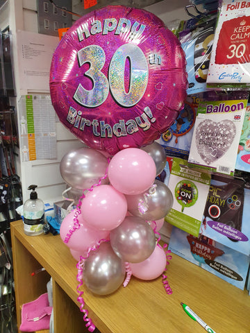 Pink 30th birthday air-filled balloon centrepiece