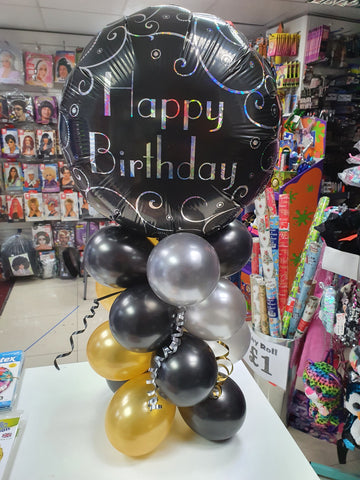 Black gold and silver air-filled happy birthday balloon display