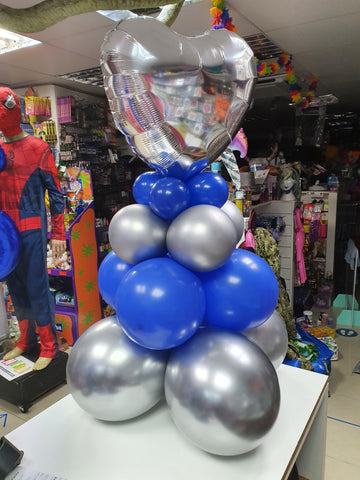 Silver and blue balloon pyramid with silver heart balloon