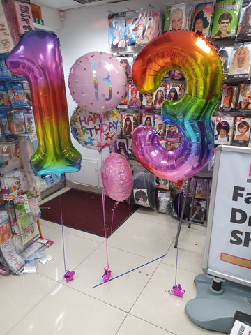 Rainbow and pink 13th birthday balloons