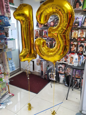 Gold 13th birthday balloons