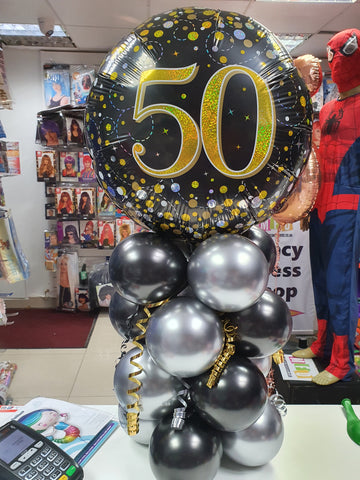 Black and silver 50th birthday display