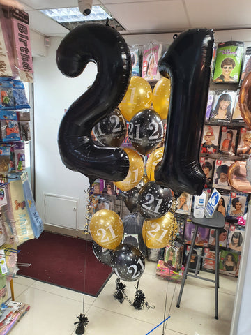 Black and gold 21st birthday balloon display