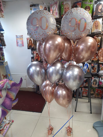 Rose gold and silver 90th birthday balloons
