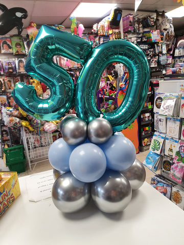 50th birthday double number table centrepiece