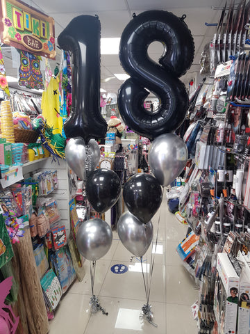 Black and silver three balloon bouquets with black number balloons