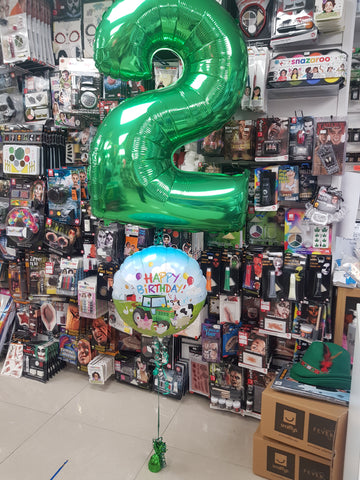 Green number two and barnyard balloon on weight