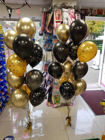 Black and gold mega balloon bouquets