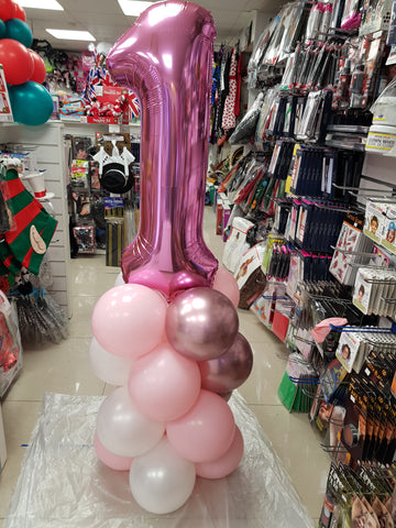 Pink First Birthday balloon column