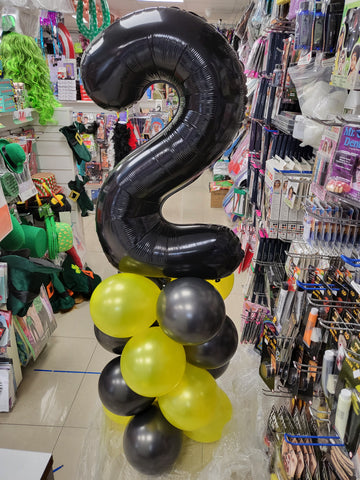 Black and yellow 2nd birthday balloon column