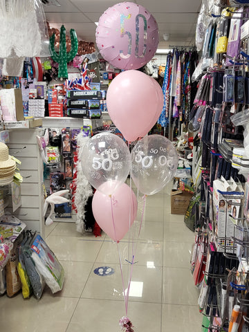 Clear and pastel pink 50th birthday five balloon bouquet with foil