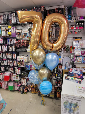 Gold and pale blue 70th birthday double number balloon bouquet
