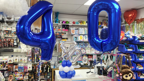 Blue and white 40th birthday double number mini centrepiece with foil numbers