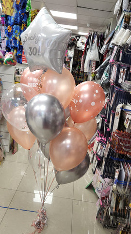 Rose gold and silver mega balloon bouquet with added personalised white star balloon