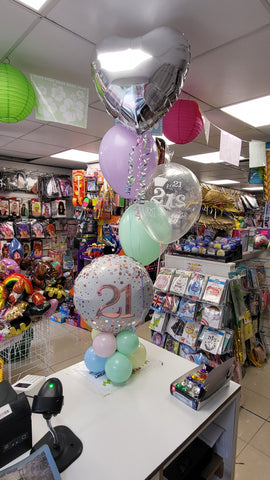 Pastel and silver 21st birthday mini pyramid balloon bouquet