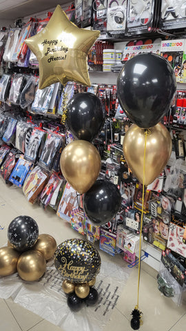 Gold and black personalised birthday balloons