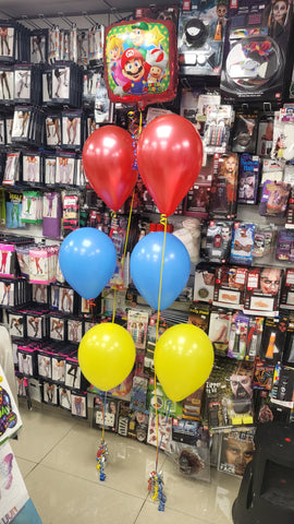 Red, blue and yellow three balloon bouquets with attached Super Mario Balloon