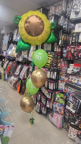 Lime green and chrome gold 40th birthday four balloon bouquet with added sunflower foil balloon