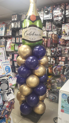 Navy blue and chrome gold champagne bottle balloon podium