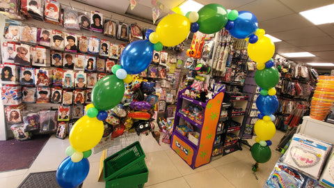 Yellow green and blue exam results day helium deluxe balloon arch