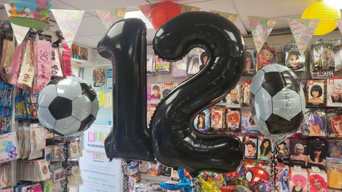 Black 12th birthday number balloons and football foils