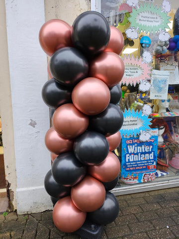 Chrome copper and black balloon podium