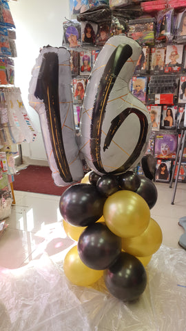 Black and gold 16th birthday balloon column