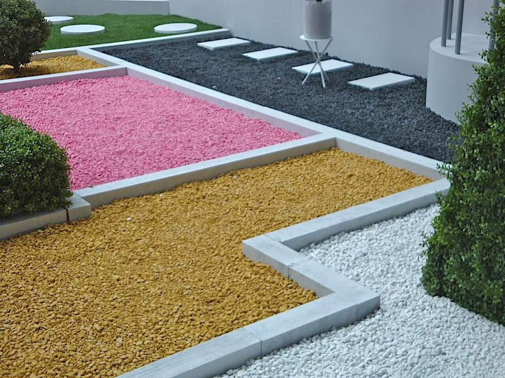 barro Reafirmar Multiplicación Gravas, gravillas y cantos rodados de colores en el jardin.