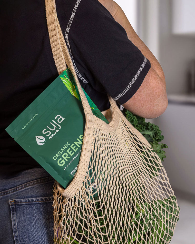 suja greens powder in bag with veggies
