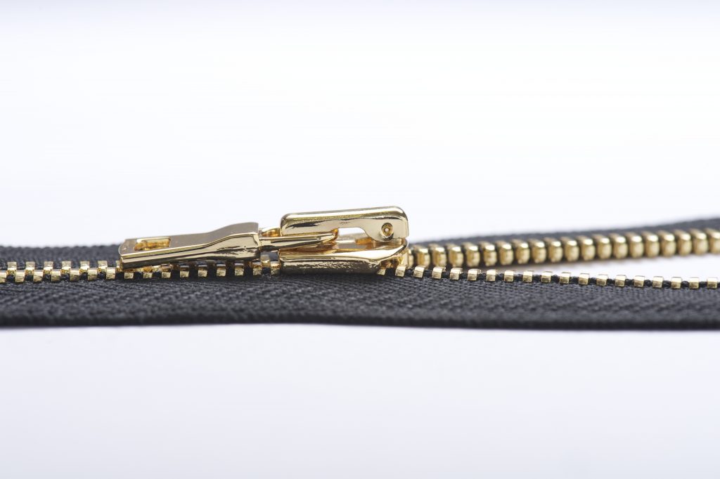 Zippers are an essential component of a designer handbag