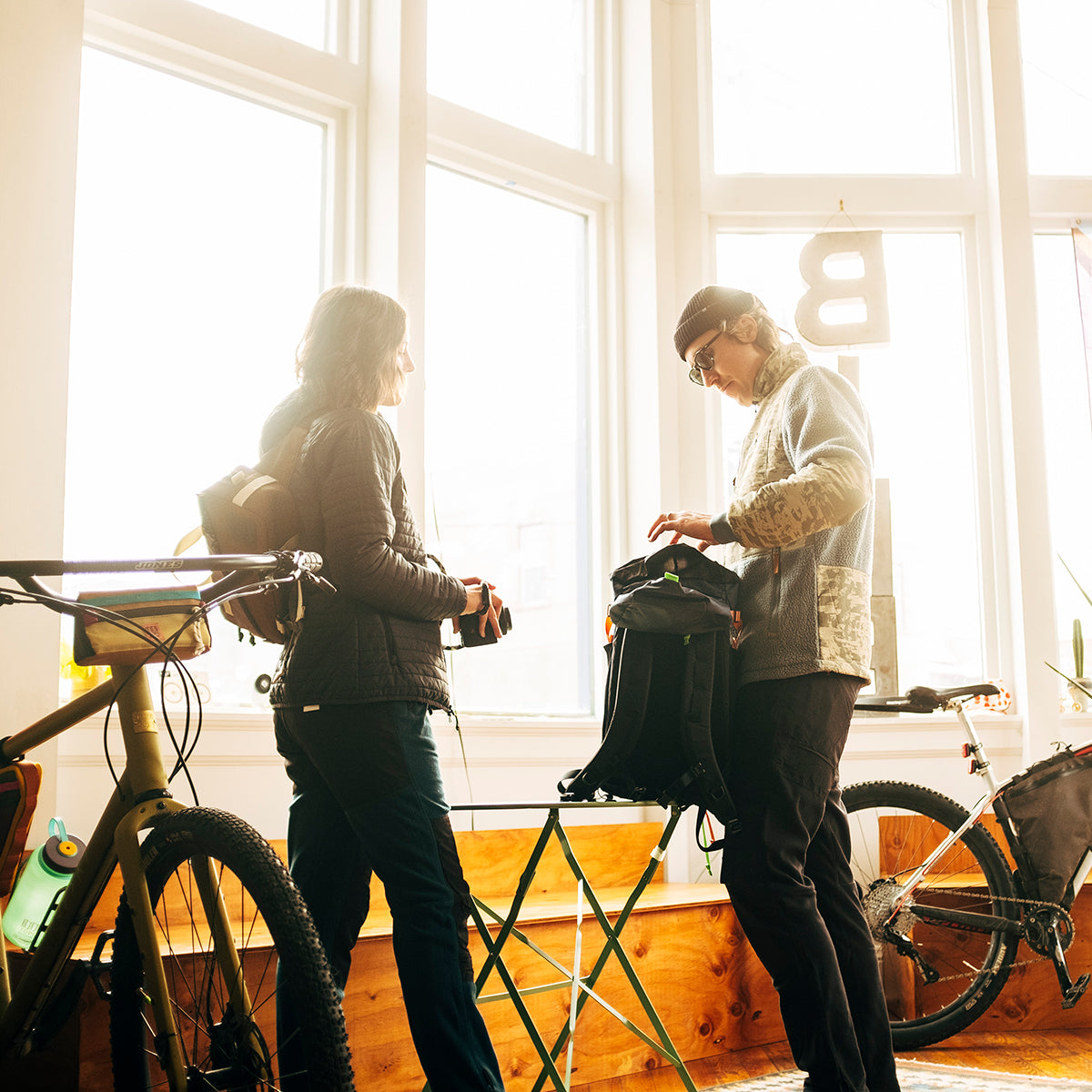 Friends preparing to bike