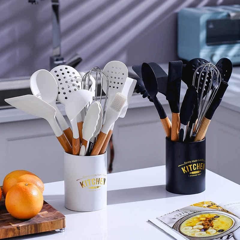 https://cdn.shopify.com/s/files/1/0277/1025/9294/files/white-black-silicone-kitchen-utensils-set-huemabe-creative-home-decor-1.jpg?v=1683879761&width=900