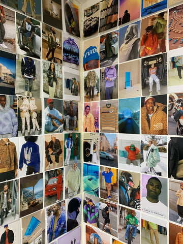 limn clothing mood board, tons of images on wall printed our across a right angled corner, pictures are vibrant and architecture or fashion related