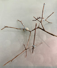 Art with sticks, rocks and wire inspired by Andy Goldworthy