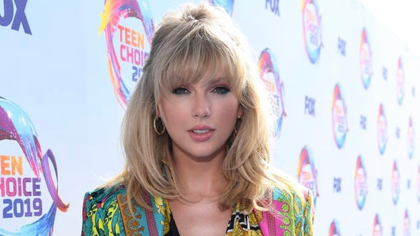 Taylor Swift wearing hoop earrings