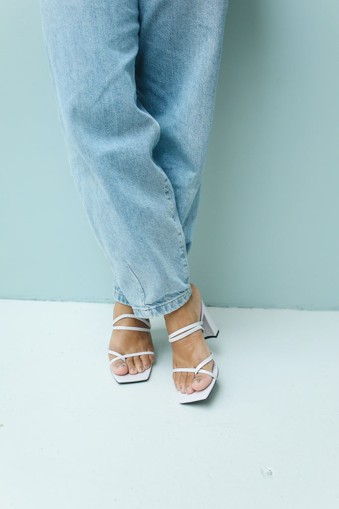 Slouchy jeans paired with Square toe heels 