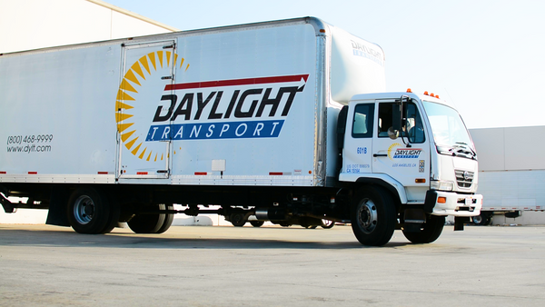 daylight freight truck power screed shipping