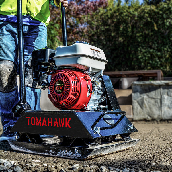 Construction crew using a Tomahawk Power plate compactor