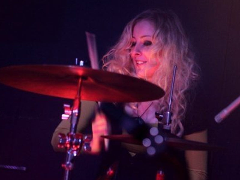Emily Dolan Davies Playing Drums