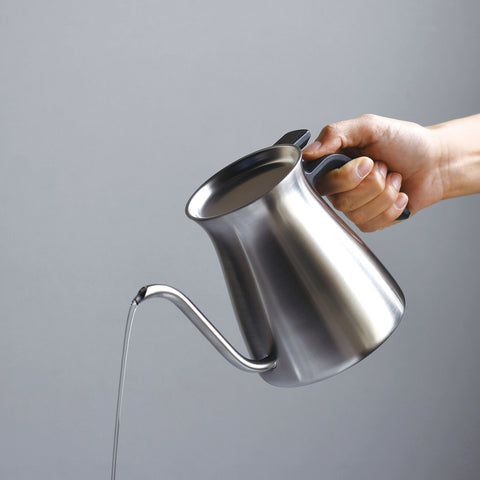 A stainless steel Pourover Kettle delivers a narrow stream of water