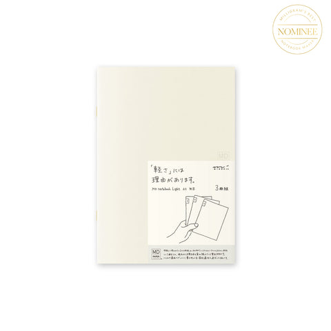 Midori Light Notebook A5, with a pale creamy cover and a cover sticker featuring Japanese characters