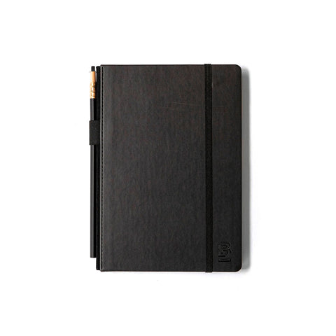 Blackwing's Slate Notebook with a solid black cover; it also has one of Blackwing's iconic pencils on the left side