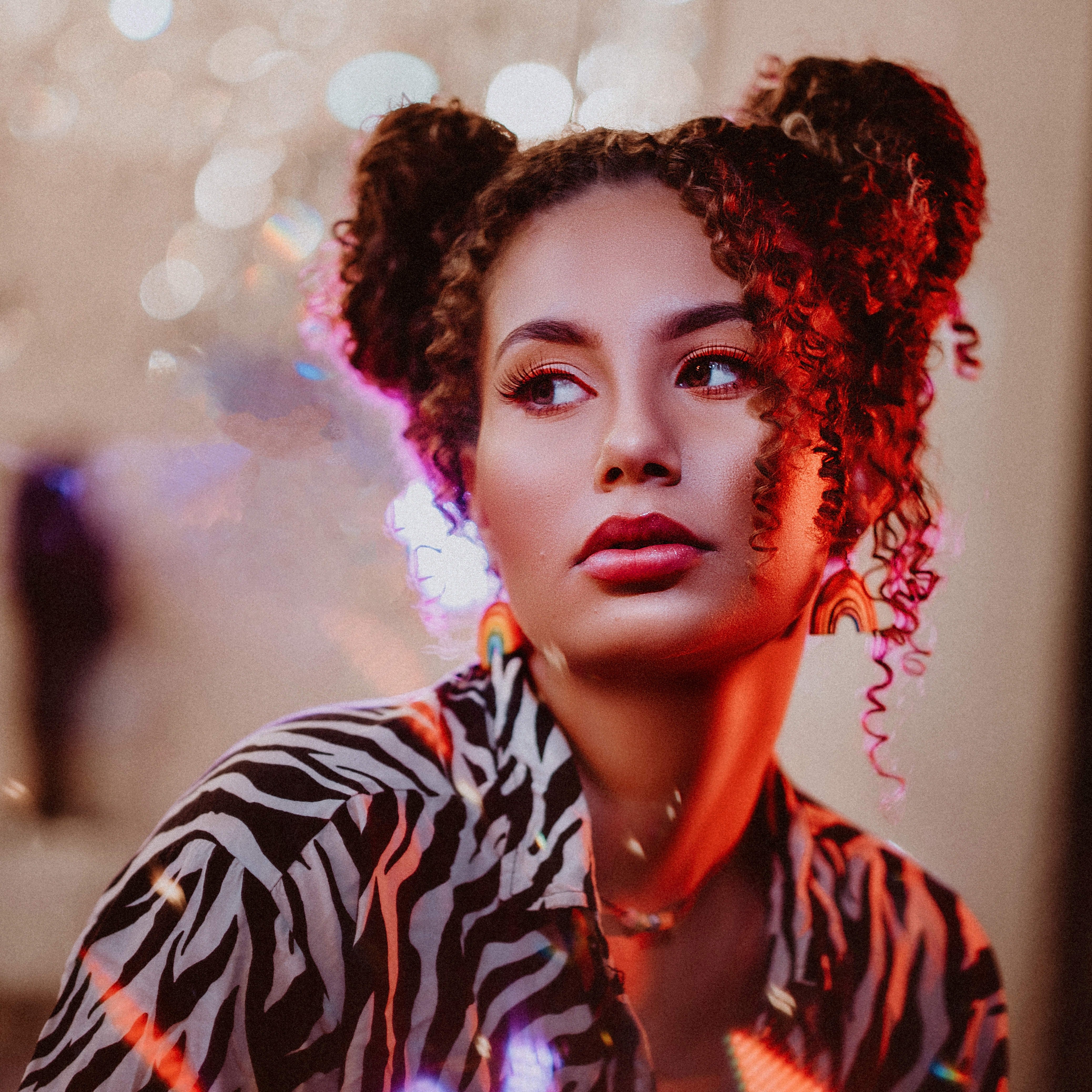 a woman with dyed hair mickey mouse hairstyle