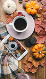 Autumn coffee and magazine with leaves