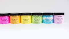 Colorful Whipped Soaps lined up on white background